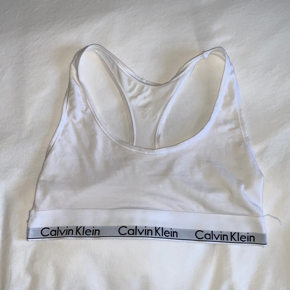 Calvin Klein bra size small. Minor discoloration shown in photo.